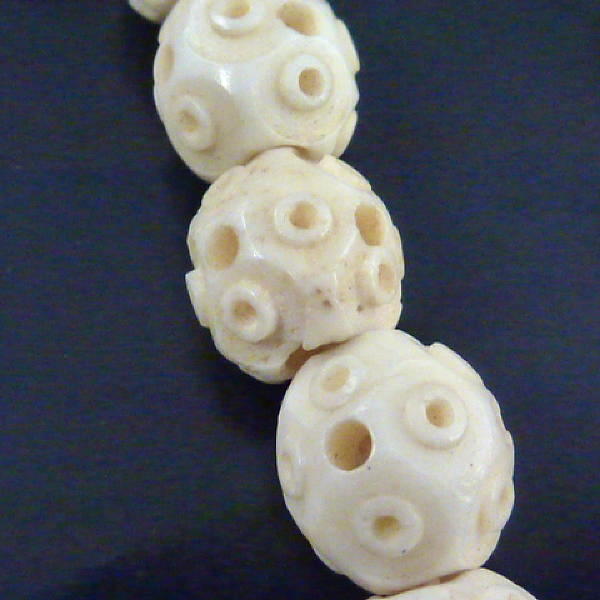 Long Strand, Carved Bone Beads, Early 20th Century.
