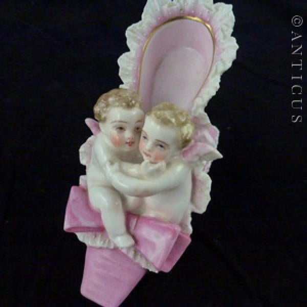 19th Century Porcelain Shoe and Cherubs Ornament.
