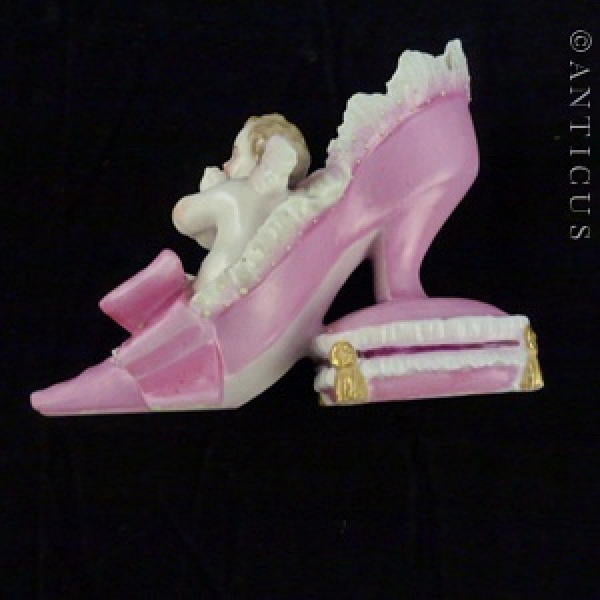 19th Century Porcelain Shoe and Cherubs Ornament.