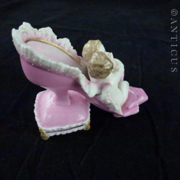 19th Century Porcelain Shoe and Cherubs Ornament.
