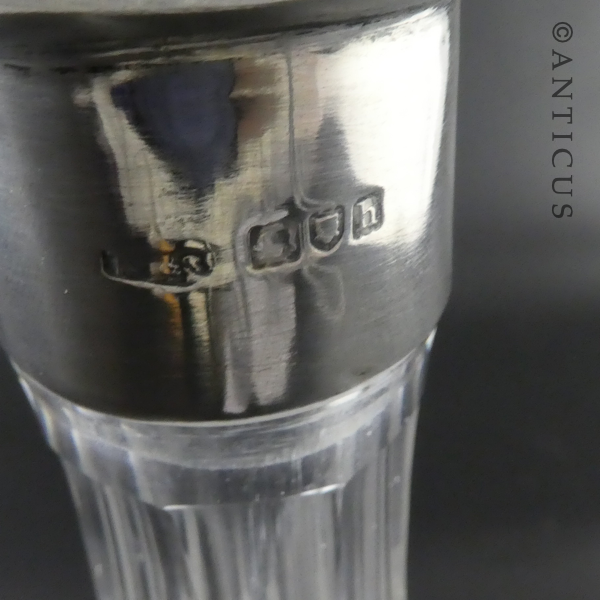 Large Heavy Crystal Decanter with Silver Neck.