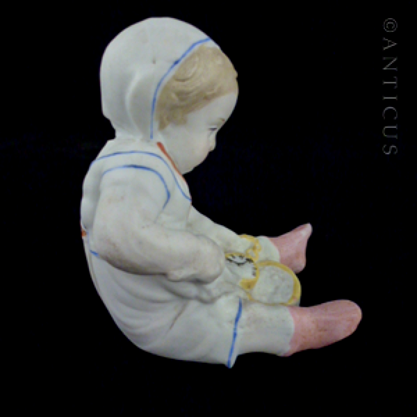 Bisque Victorian Piano Baby.