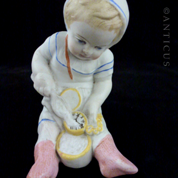 Bisque Victorian Piano Baby.