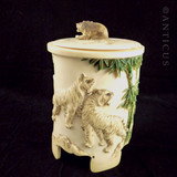 Carved Ivory Lidded Jar with Tigers and Elephants.