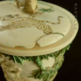 Carved Ivory Lidded Jar with Tigers and Elephants.