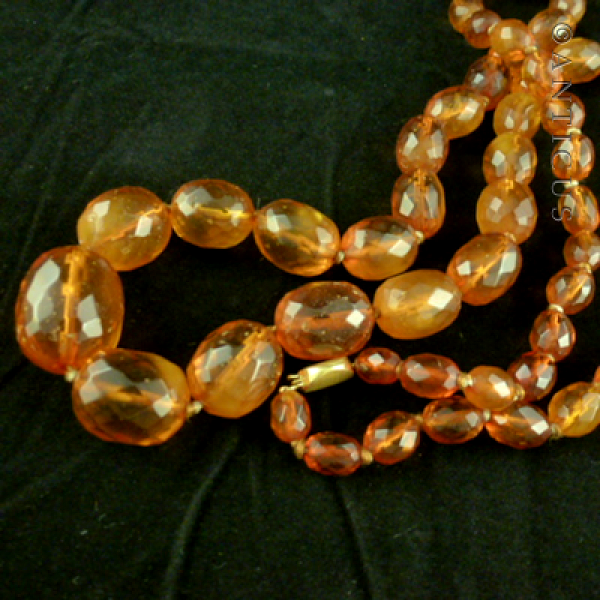 Long Strand of Faceted Baltic Amber Beads.