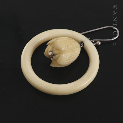 Pair of Ivory Hoop and Flower Earrings.