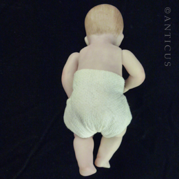 Child's Bisque Small Doll, Jointed Limbs.