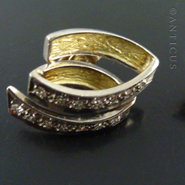 Pair of White Gold and Diamond Earrings.