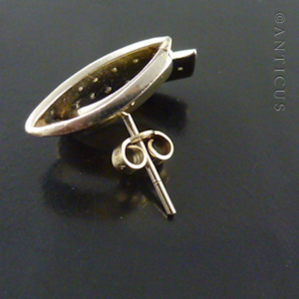 Pair of White Gold and Diamond Earrings.