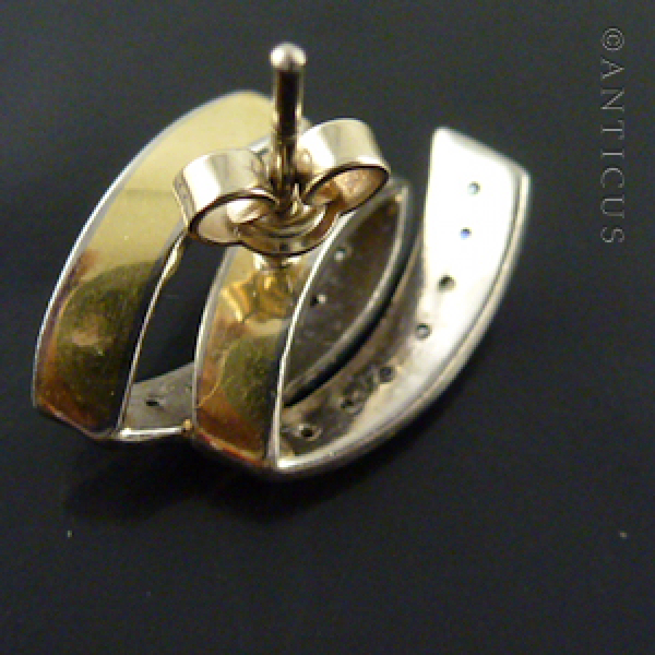 Pair of White Gold and Diamond Earrings.