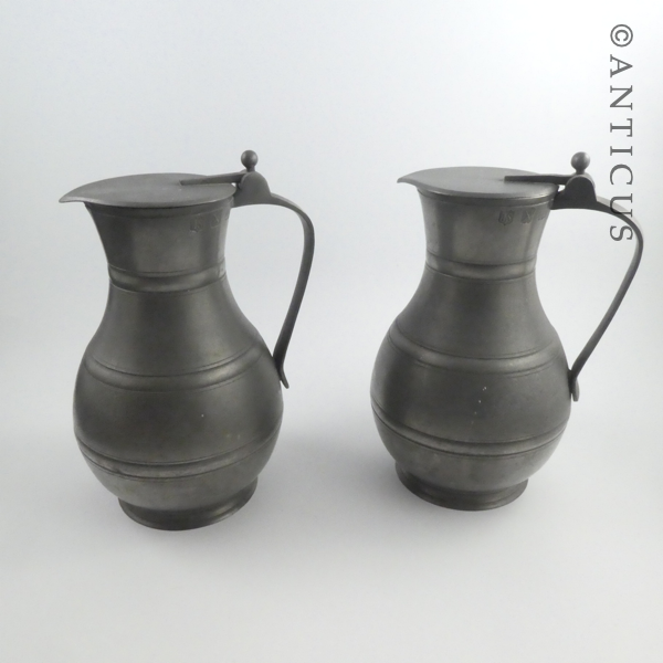 Pair of Vintage Pewter Lidded Jugs.