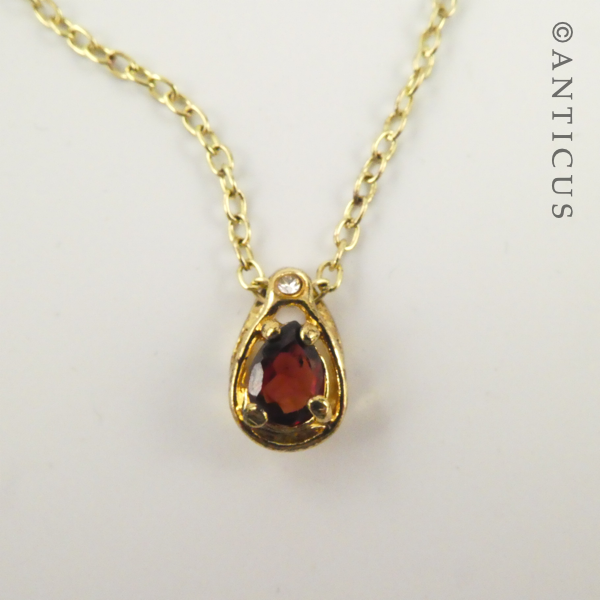 Garnet and Gold Plated Pendant on Chain.