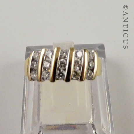 18ct Gold and Channel-Set Diamond Ring.
