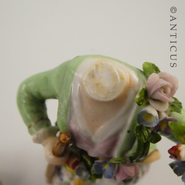 Three European Figurines, Damage.