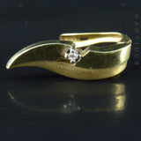 Gold and Diamond Leaf-Shaped Earrings.