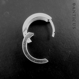 Tiny Pair of Silver Hoop Earrings.