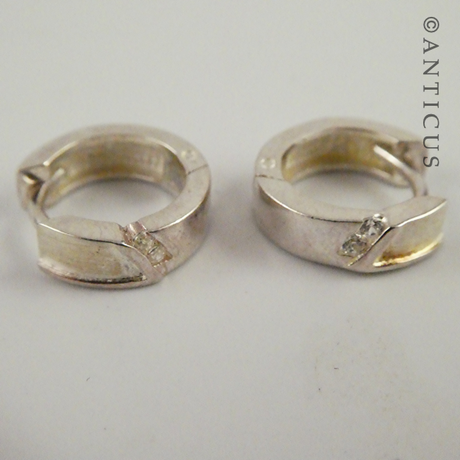 Sterling Silver Tiny Hoop Earrings.