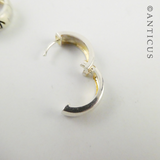 Small Silver Hoop Earrings with Abstract Design.