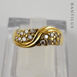 14K Gold and 16 Diamond Ring.