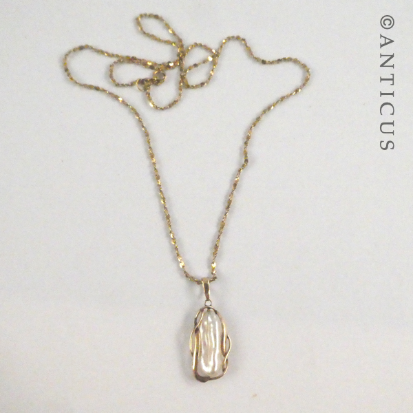Baroque Pearl Pendant on Gold Chain.