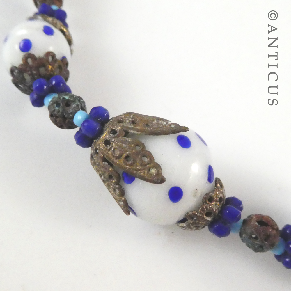 Necklace of Handmade Blue and White Glass Beads.