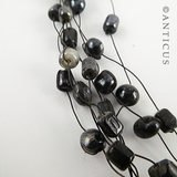 Floating Necklace, Black and Grey Beads.