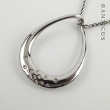 Silver Pendant on Chain with Diamonds.