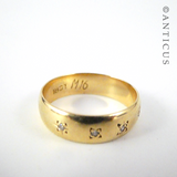 18ct Gold Band with inset Small Diamonds.