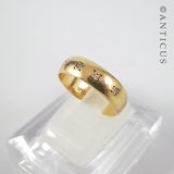 18ct Gold Band with inset Small Diamonds.
