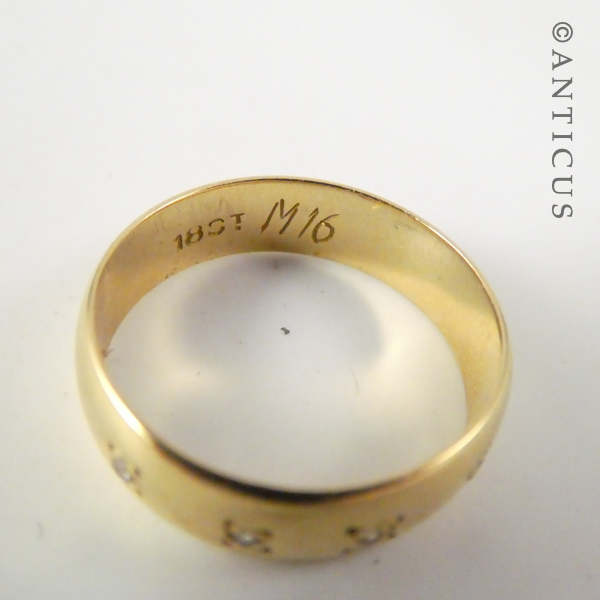 18ct Gold Band with inset Small Diamonds.