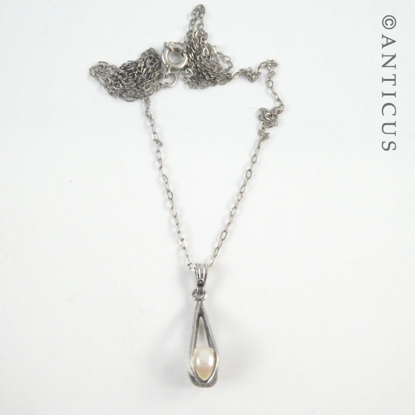 Pearl in Cage Silver Pendant.