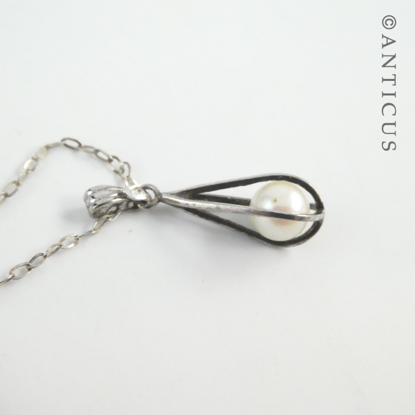 Pearl in Cage Silver Pendant.