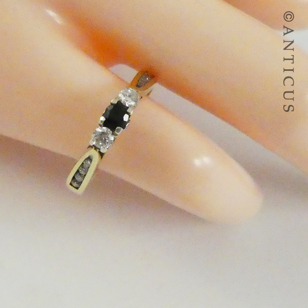 Gold, Sapphire and Diamond Ring with Side Diamonds.