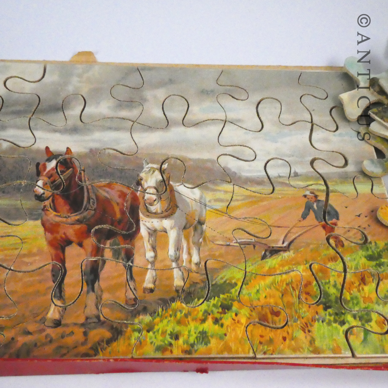 Antique Boxed Sets of Four Dutch Jigsaw Puzzles.