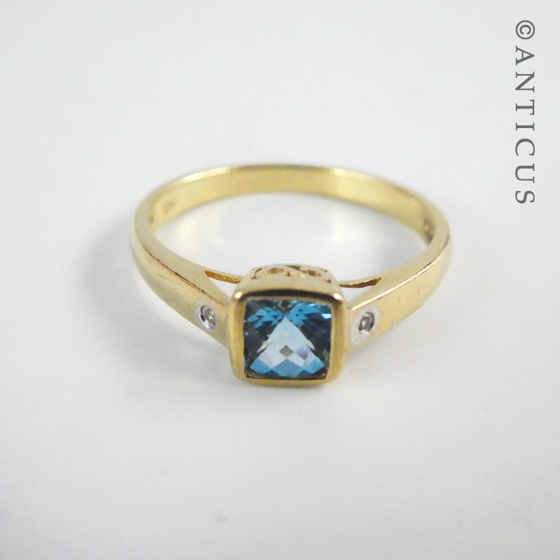 Pretty Blue Topaz and Diamond Ring.