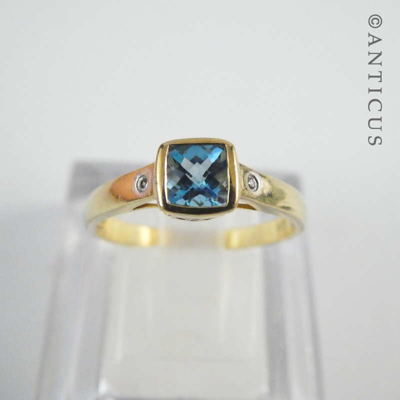 Pretty Blue Topaz and Diamond Ring.