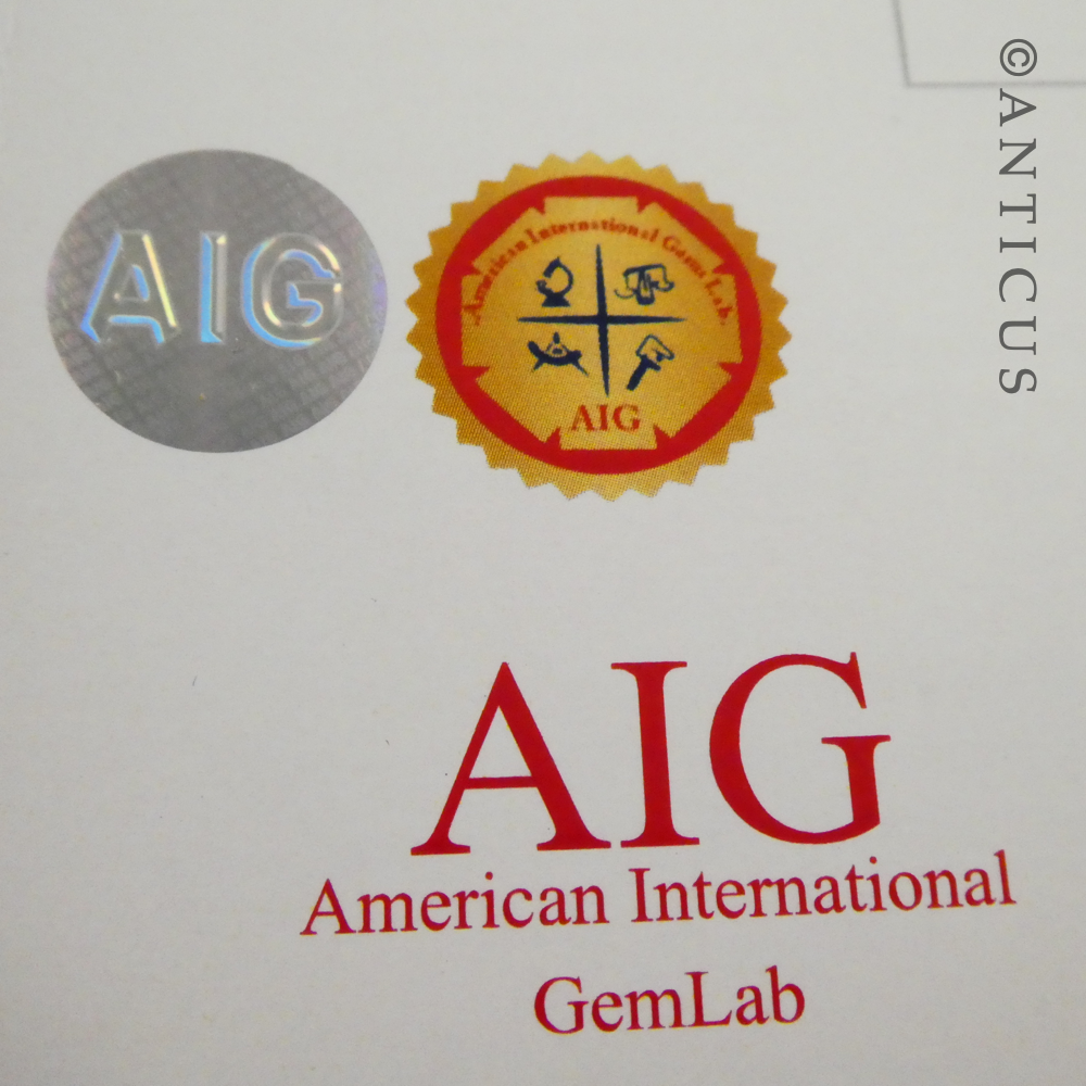 Large Ruby Cabochon, Silver Mount. AIG Cert.