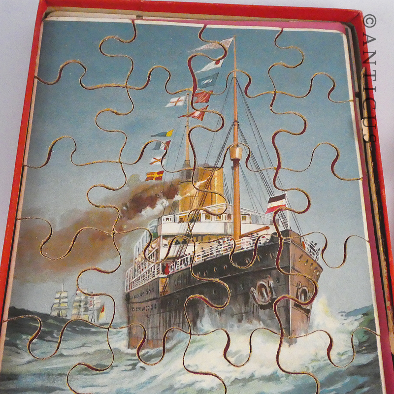 Antique Boxed Set of Four Dutch Jigsaw Puzzles.