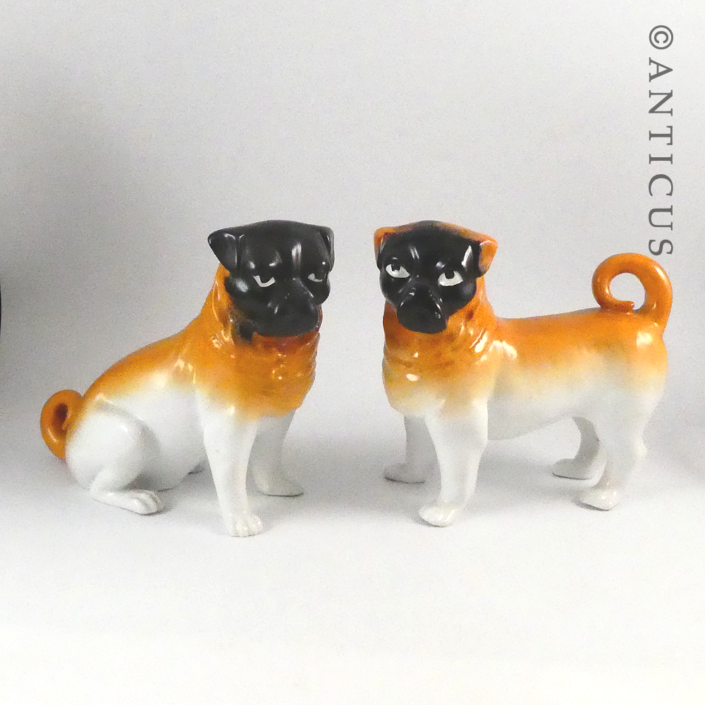 Pair of Victorian Pug Dog Figurines.