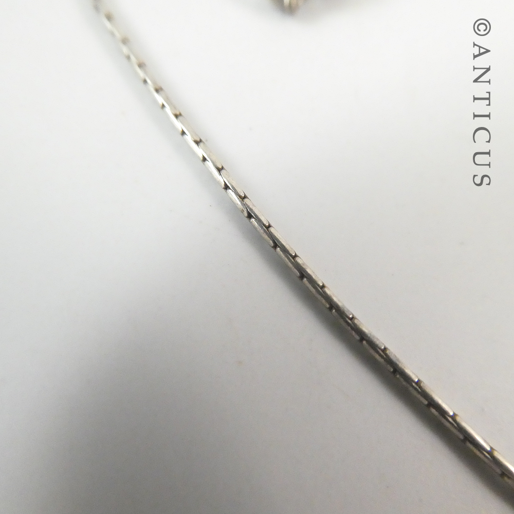 Silver Chain with Sliding Black Pearl.