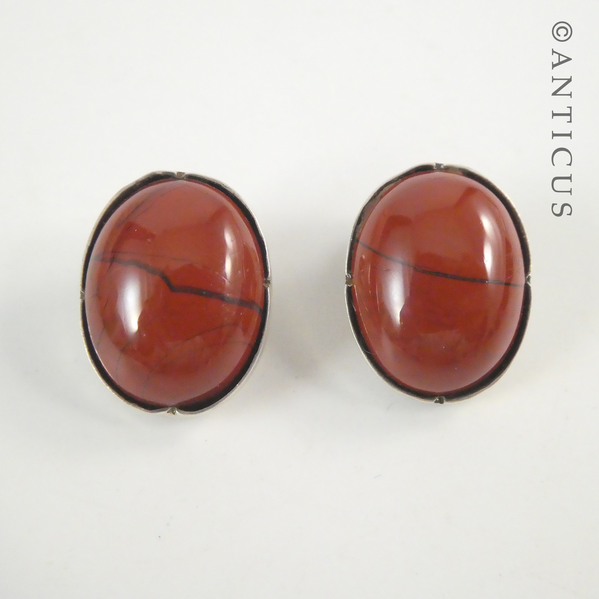 Brick-Coloured Clip Earrings with Silver Mounts.