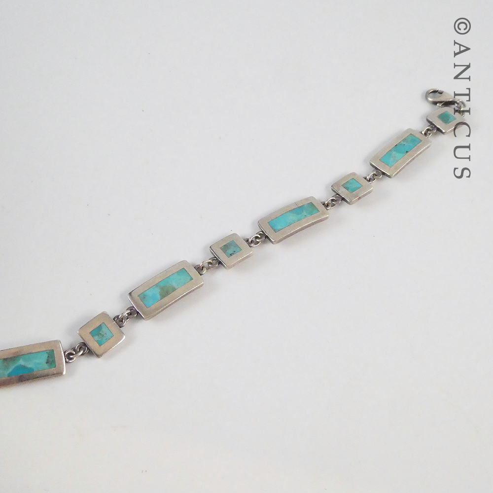 Silver Bracelet with Turquoise Panels.