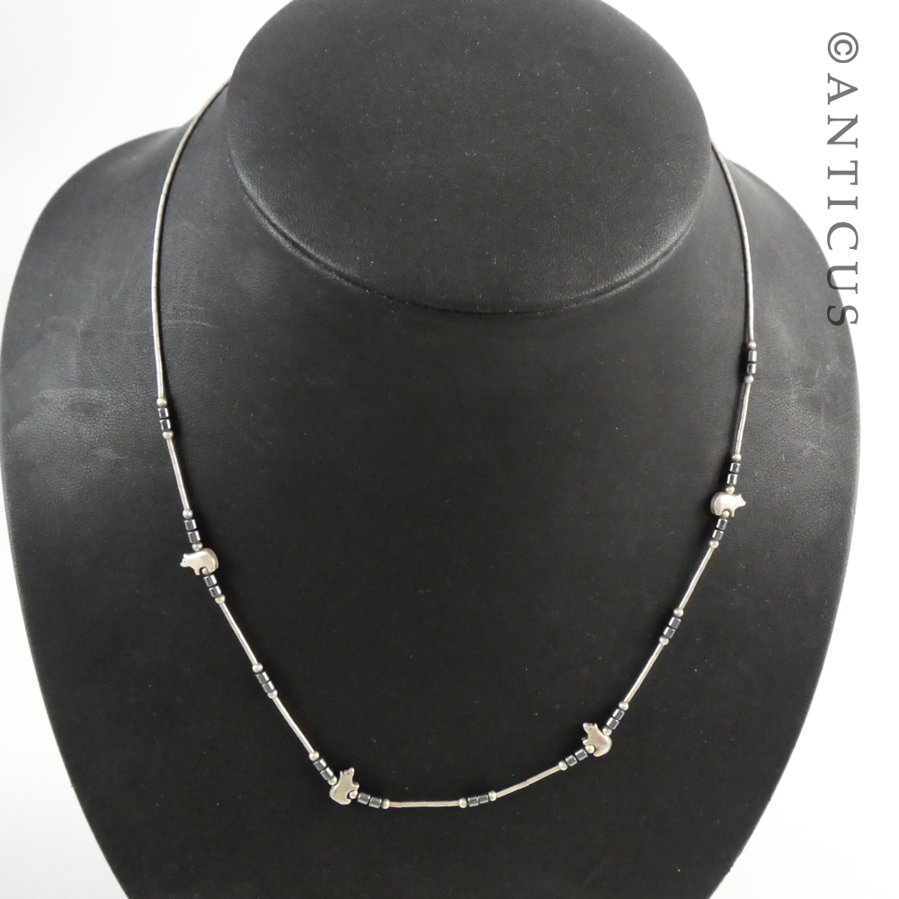 Slim Necklace with Little Pigs.