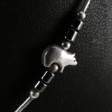 Slim Necklace with Little Pigs.