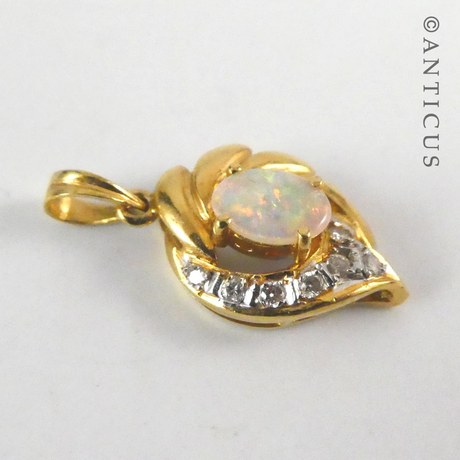 Small 18ct Gold, Opal and Diamond Pendant.