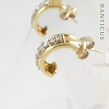 Gold and Diamond Half-Hoop Earrings.