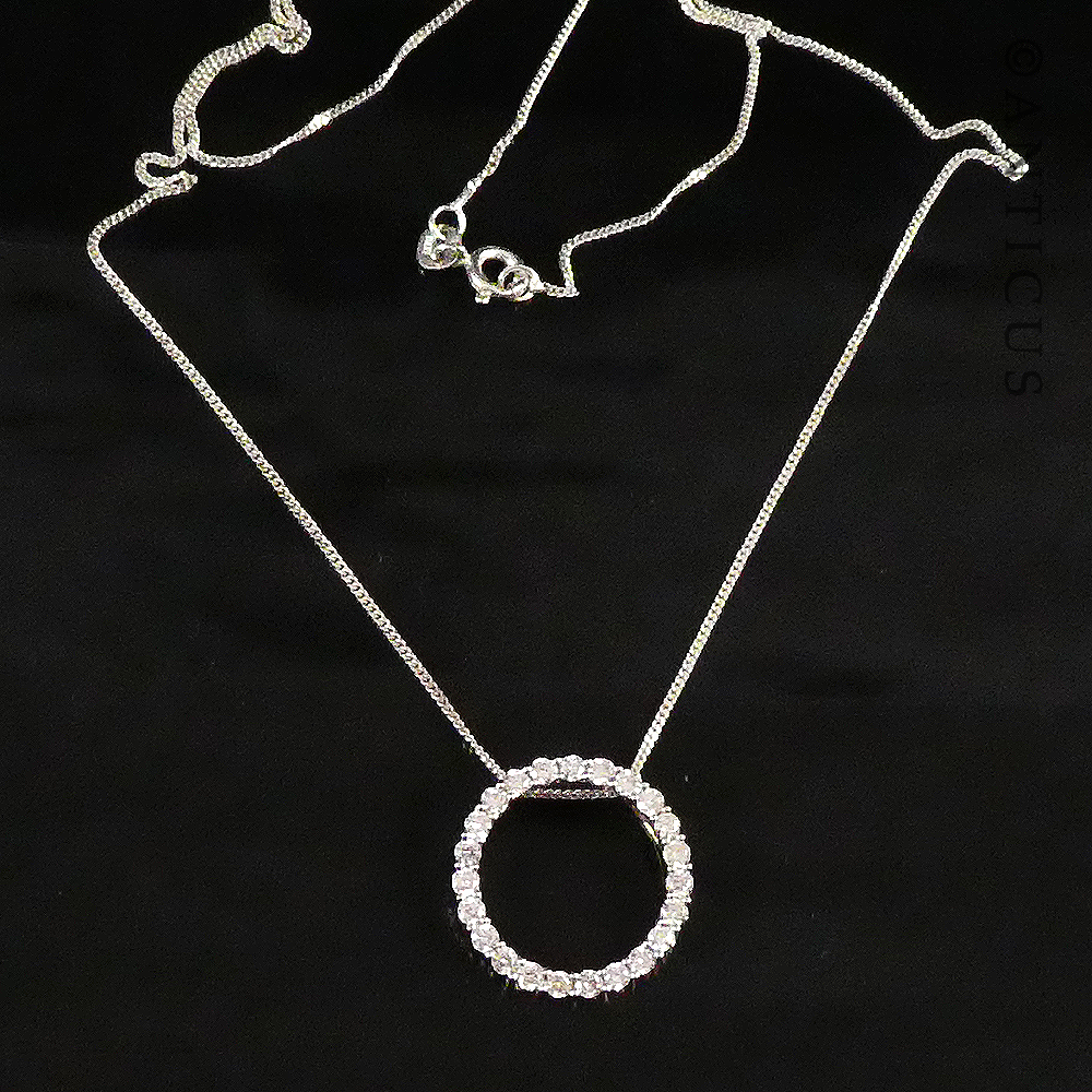 Gold and Diamond Circular Pendant on Chain.