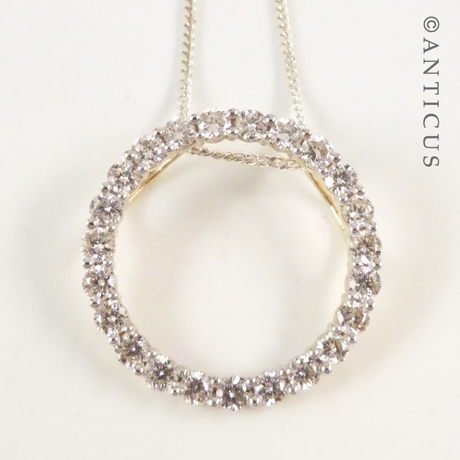 Gold and Diamond Circular Pendant on Chain.