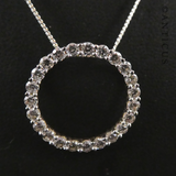 Gold and Diamond Circular Pendant on Chain.